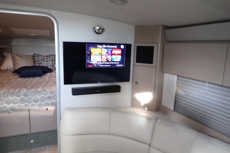 Slide: The Image of Interior of 2020 Formula 40 Performance Cruiser with TV, seating, and bed. - 10