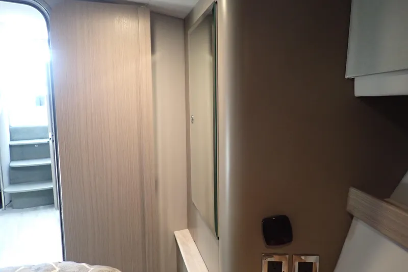 Slide: The Image of Interior of 2020 Formula 40 Performance Cruiser, featuring modern design and wooden accents. - 13