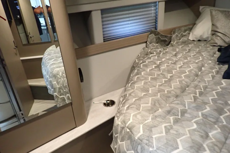 Slide: The Image of 2020 Formula 40 Performance Cruiser interior with bed, mirror, and modern decor. - 16