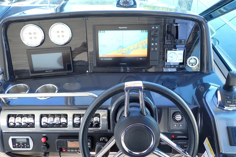 Slide: The Image of 2020 Formula 40 Performance Cruiser dashboard with navigation and control systems. - 17