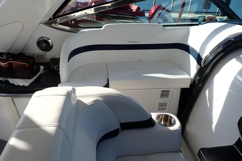 Slide: The Image of Interior of 2020 Formula 40 Performance Cruiser with white seating and cup holder. - 19