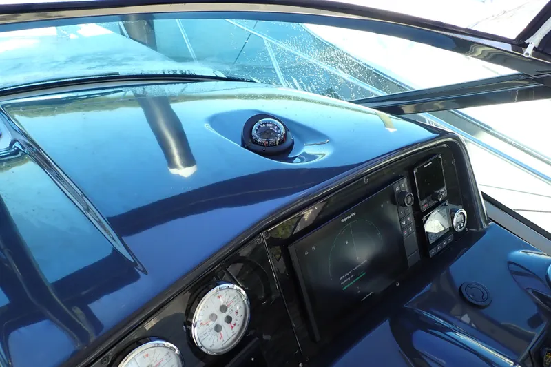 Slide: The Image of 2020 Formula 40 Performance Cruiser dashboard with navigation instruments and compass. - 23