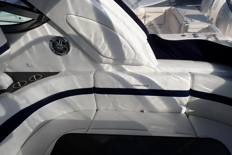 Slide: The Image of 2020 Formula 40 Performance Cruiser interior with white seating and cup holders. - 27