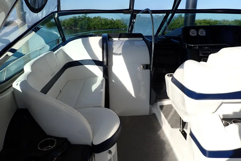 Slide: The Image of 2020 Formula 40 Performance Cruiser interior with white seating and modern dashboard. - 30