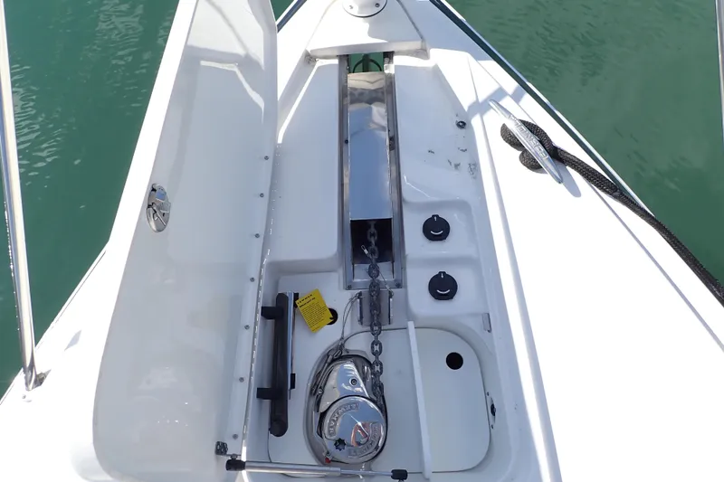 Slide: The Image of 2020 Formula 40 Performance Cruiser anchor system on deck, featuring winch and chain. - 35