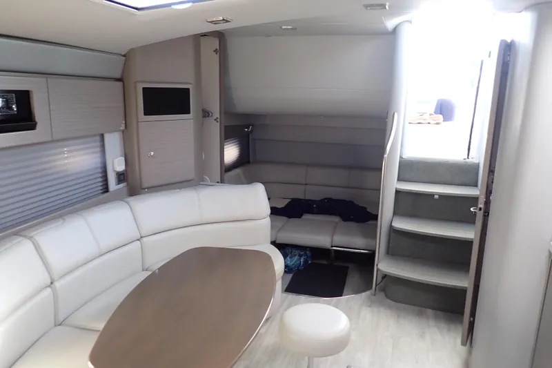 Slide: The Image of Interior of 2020 Formula 40 Performance Cruiser with modern seating and wooden table. - 4