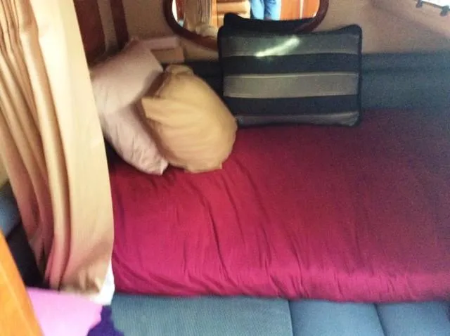 Slide: The Image of Interior of 2006 Four Winns 328 Vista with cozy bed. - 15