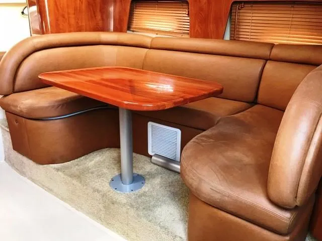 Slide: The Image of Luxurious leather seating area in a 2006 Four Winns 328 Vista yacht. - 19