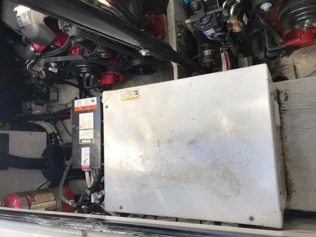 Slide: The Image of Engine compartment of a 2006 Four Winns 328 Vista boat. - 26