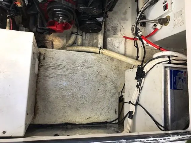 Slide: The Image of Engine compartment of a 2006 Four Winns 328 Vista boat. - 27