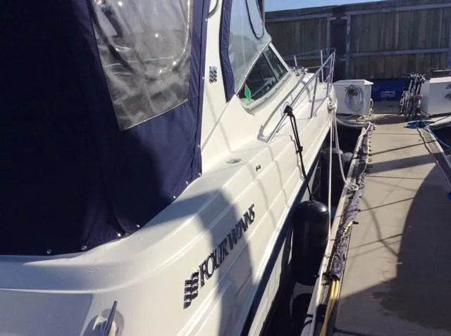 Slide: The Image of 2006 Four Winns 328 Vista boat docked. - 4