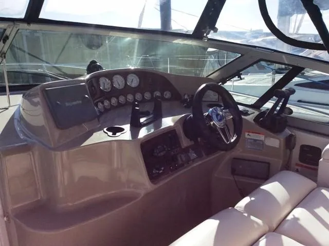 Slide: The Image of Interior view of 2006 Four Winns 328 Vista boat cockpit. - 7