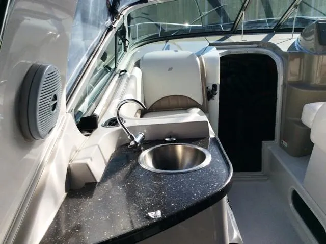 Slide: The Image of Interior of a 2006 Four Winns 328 Vista yacht with sink. - 9