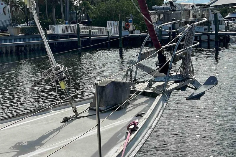 Slide: The Image of 1980 Wellington 44 Cutter Center Cockpit sailboat docked in a marina. - 10