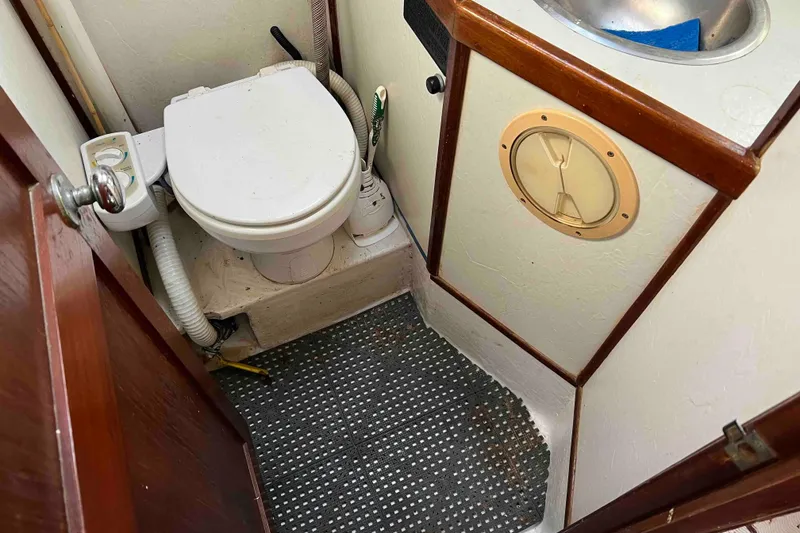 Slide: The Image of Compact marine bathroom in 1980 Wellington 44 Cutter Center Cockpit yacht. - 28