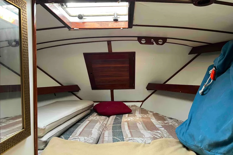 Slide: The Image of Cozy cabin interior of 1980 Wellington 44 Cutter Center Cockpit sailboat. - 32