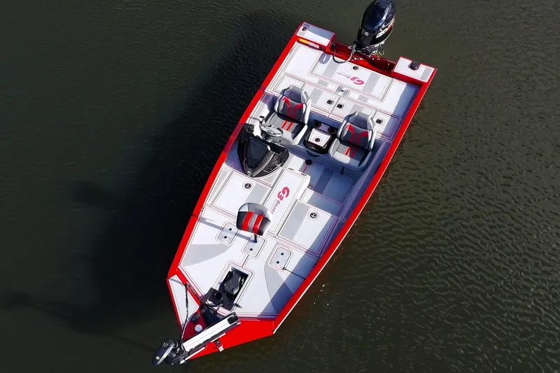 Slide: The Image of 2026 G3 Sportsman 1710 SE boat on water, aerial view, red and gray design. - 21