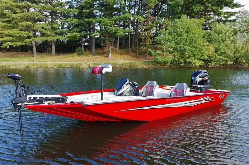 Slide: The Image of 2026 G3 Sportsman 1710 SE boat on a serene lake with lush trees. - 22