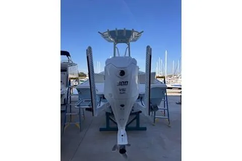 Slide: The Image of 2024 Pathfinder 2500 Hybrid boat console with steering wheel and navigation controls. - 5