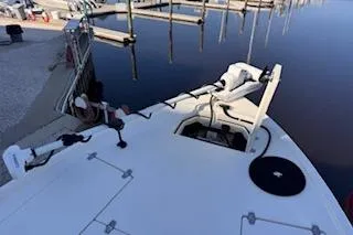 Slide: The Image of 2024 Pathfinder 2500 Hybrid boat interior with Yamaha and Suzuki engines, featuring seating and storage. - 8