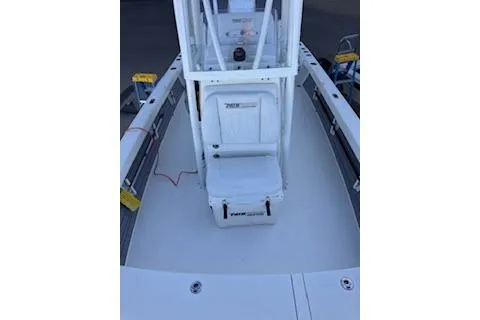 Slide: The Image of 2024 Pathfinder 2500 Hybrid boat on a stand, showcasing sleek design and branding. - 9