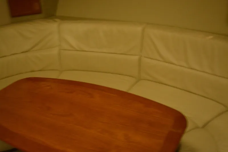 Slide: The Image of Luxurious cabin interior of 2006 Formula 40 Performance Cruiser with plush bedding and pillows. - 26
