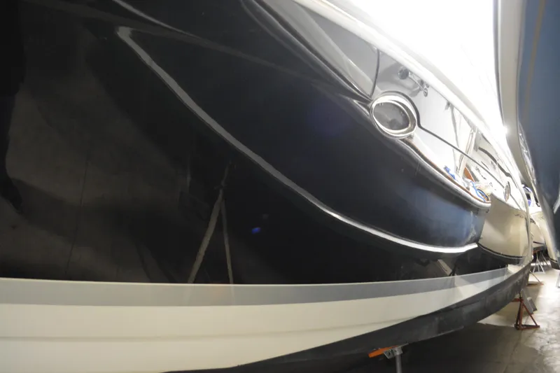 Slide: The Image of 2006 Formula 40 Performance Cruiser in indoor storage with other boats. - 7