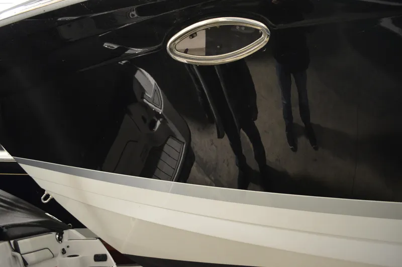 Slide: The Image of 2006 Formula 40 Performance Cruiser cockpit with Garmin navigation and luxurious white seating. - 8