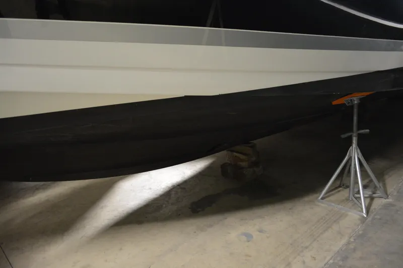 Slide: The Image of 2006 Formula 40 Performance Cruiser helm with wood accents and modern controls. - 9