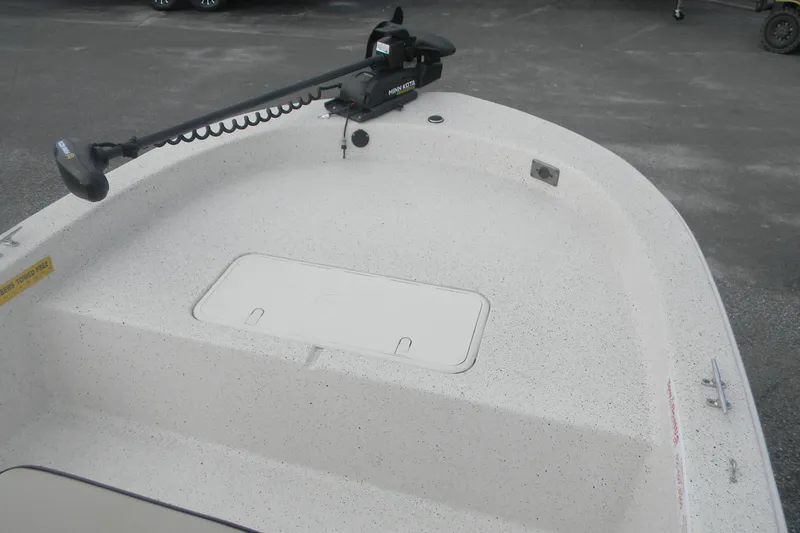 Slide: The Image of 2024 Carolina Skiff e-18 boat deck with trolling motor, speckled finish. - 3