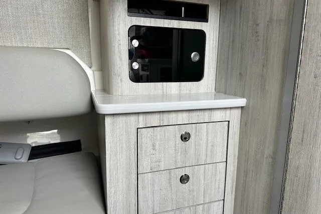 Slide: The Image of 2022 Regulator 41 interior with modern cabinetry and sleek design. - 18