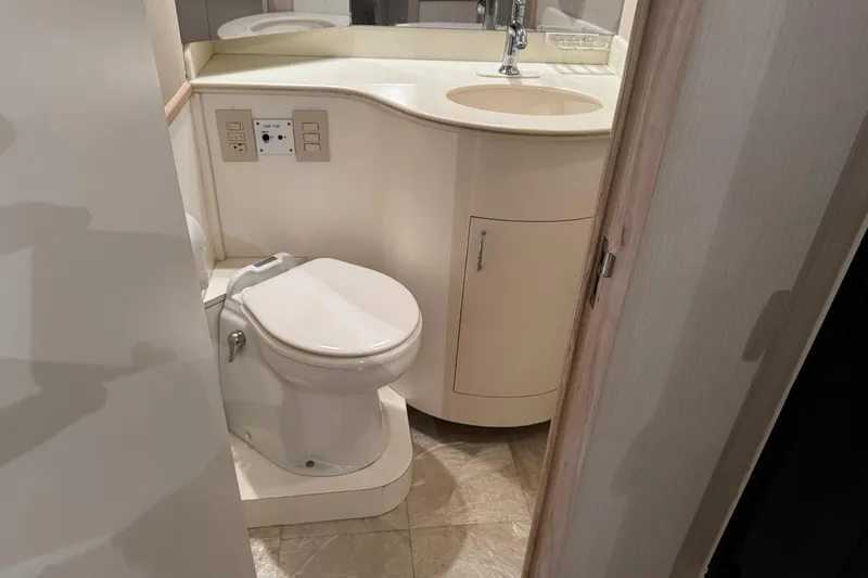 Slide: The Image of Bathroom interior of 1993 Blackfin 38 Combi yacht with toilet and sink. - 13