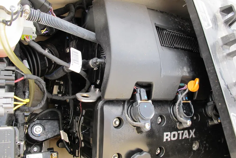 Slide: The Image of 2019 Sea-Doo GTX Limited 230 engine compartment with Rotax components and wiring. - 5