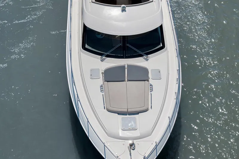 Slide: The Image of 2020 Riviera 4800 Sport Yacht on calm water, aerial view. - 12