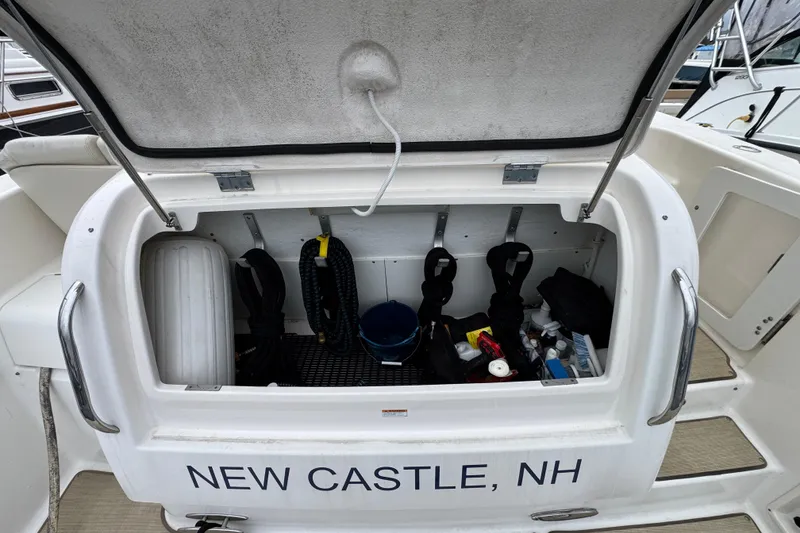 Slide: The Image of Open storage compartment on 2008 Tiara Yachts 3900 Sovran, New Castle, NH. - 11