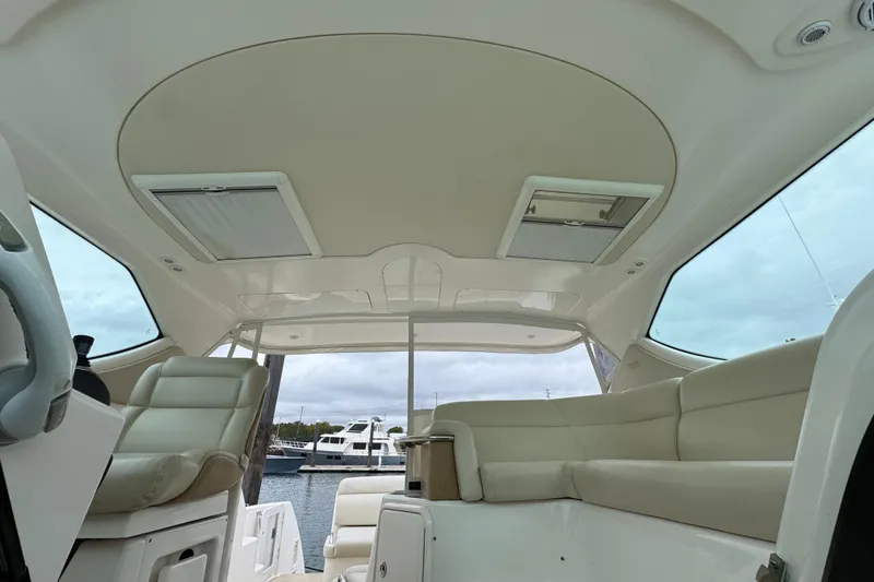 Slide: The Image of Interior of 2008 Tiara Yachts 3900 Sovran with plush seating and sleek design. - 18