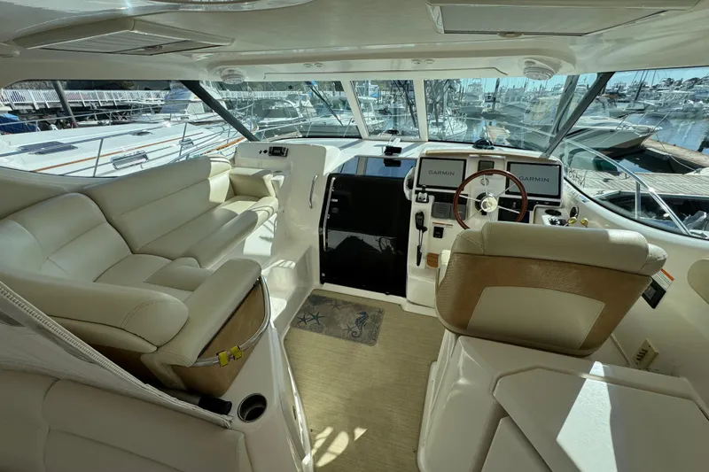 Slide: The Image of 2008 Tiara Yachts 3900 Sovran interior with leather seating and modern navigation equipment. - 19