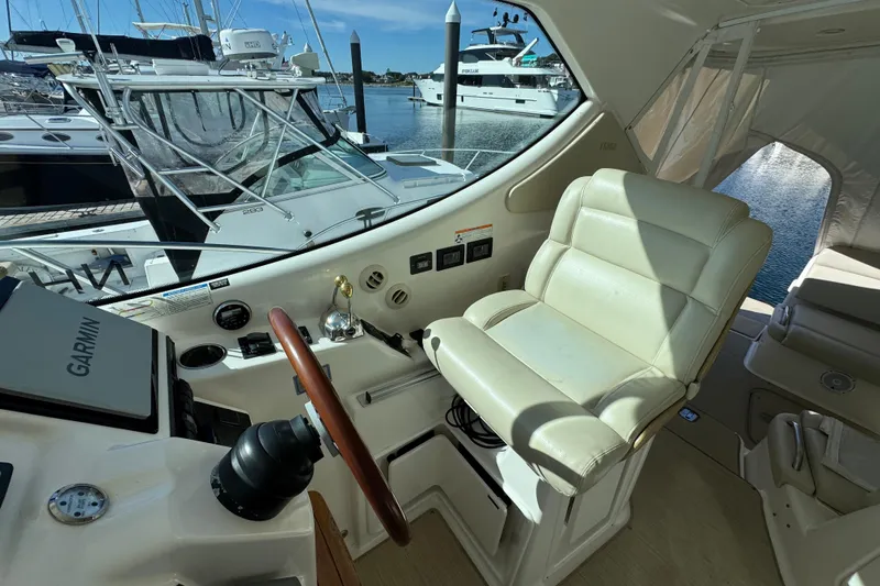 Slide: The Image of 2008 Tiara Yachts 3900 Sovran helm with leather captain's chair and Garmin navigation system. - 25