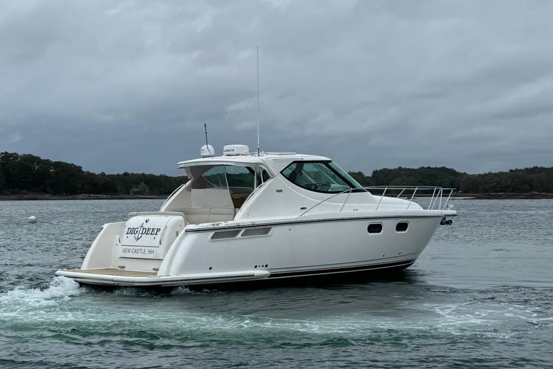 Slide: The Image of 2008 Tiara Yachts 3900 Sovran cruising on a cloudy day. - 3