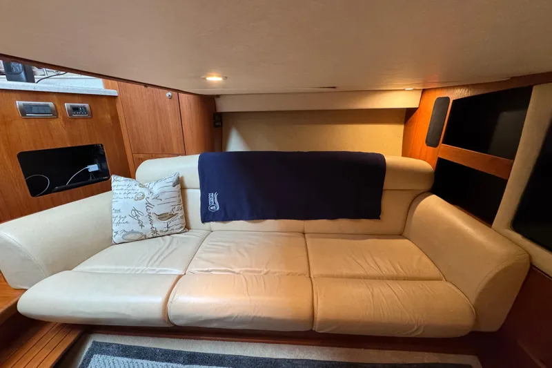 Slide: The Image of Luxurious interior of 2008 Tiara Yachts 3900 Sovran with beige leather seating. - 47