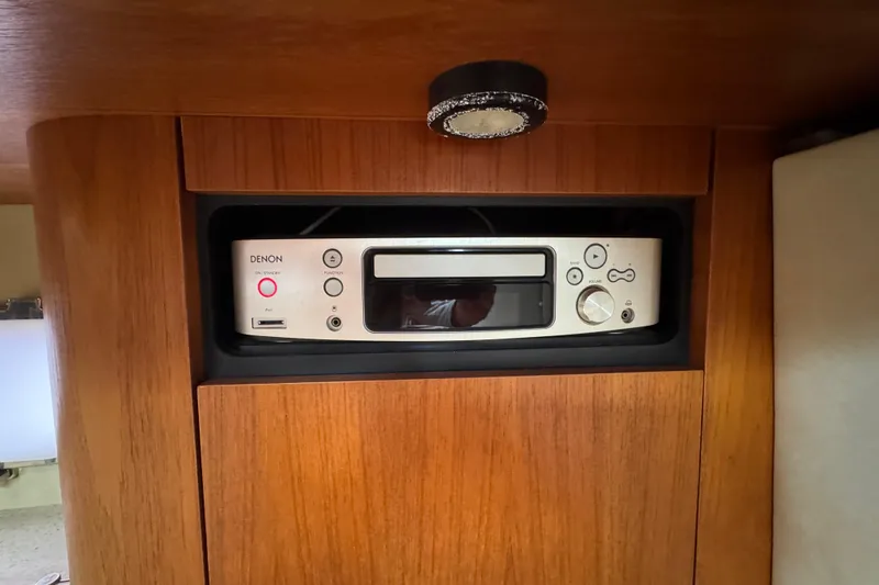 Slide: The Image of Denon audio system in 2008 Tiara Yachts 3900 Sovran interior, wooden paneling. - 49