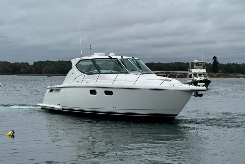 Slide: The Image of 2008 Tiara Yachts 3900 Sovran on calm waters. - 5