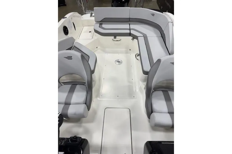 Slide: The Image of 2026 Bayliner V20 boat interior with modern seating and sleek design. - 6