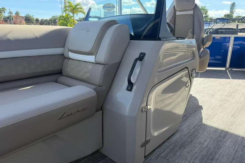 Slide: The Image of 2026 Bennington S 21 SL boat interior with luxurious seating and sleek design. - 10