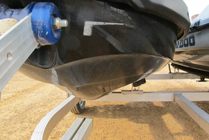 Slide: The Image of 2019 Sea-Doo GTI SE 155 on trailer, showing hull detail and trailer components. - 3