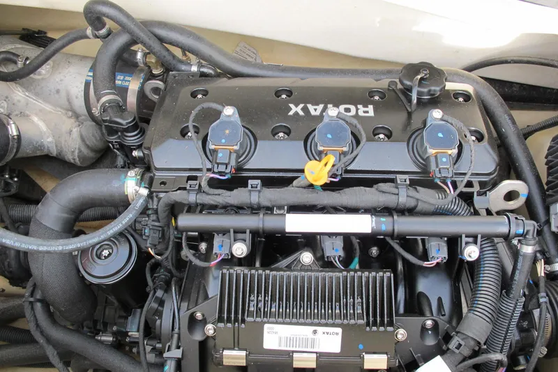 Slide: The Image of 2019 Sea-Doo GTI SE 155 engine, showcasing Rotax components and intricate wiring. - 5