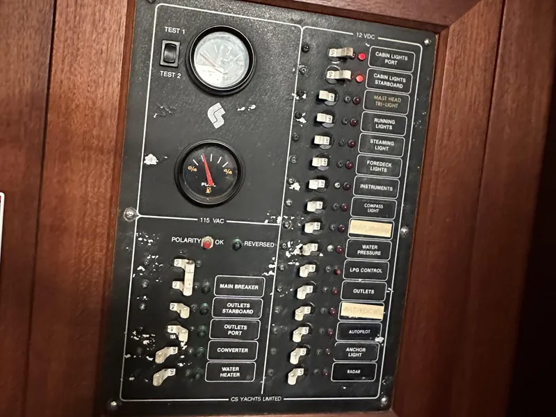 Slide: The Image of Electrical panel of a 1989 Canadian Sailcraft CS40 yacht with switches and gauges. - 25