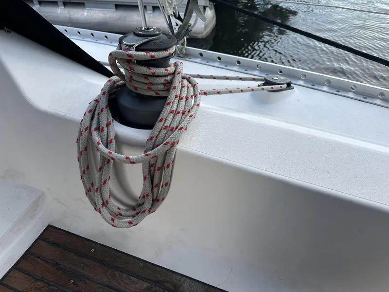 Slide: The Image of Winch with coiled rope on 1989 Canadian Sailcraft CS40 sailboat deck. - 35