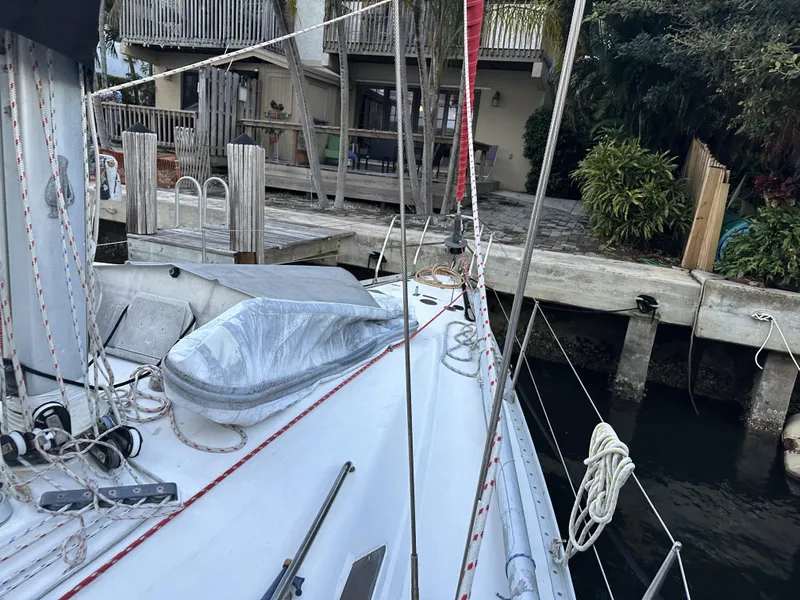 Slide: The Image of 1989 Canadian Sailcraft CS40 sailboat docked, showing deck and rigging details. - 49