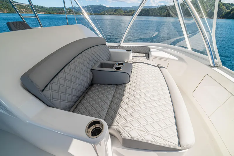 Slide: The Image of Luxurious seating on 2026 Viking 64 Convertible yacht with ocean view. - 39
